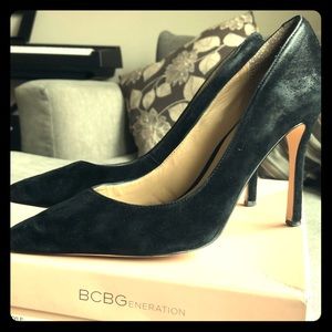 Black suede pumps